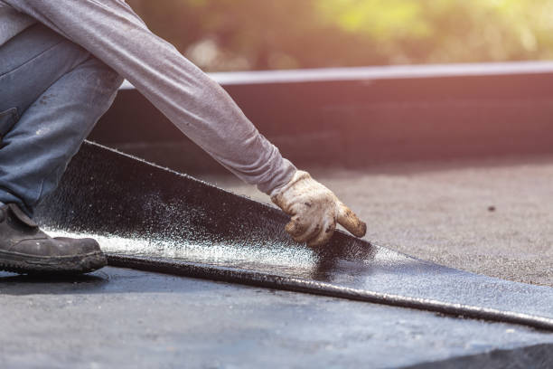 Professional Emergency Waterproofing technician working in Bellevue, WI